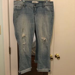 Torrid light denim distressed boyfriend capris.